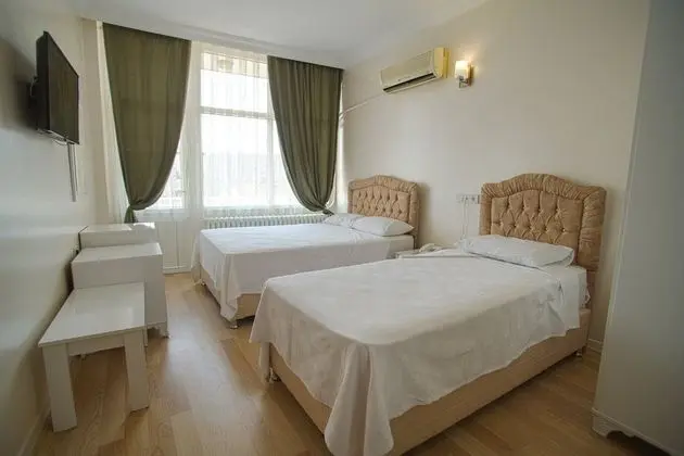 Üç Kişilik Oda