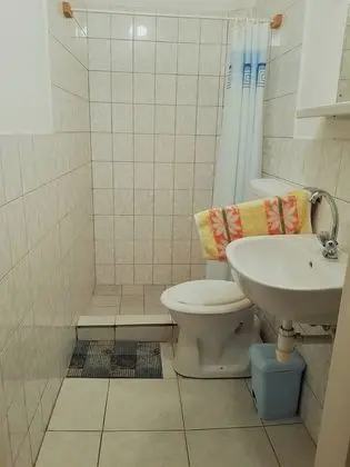 Standard Üç Kişilik Oda, Birden Çok Yatak, Bahçe Manzaralı