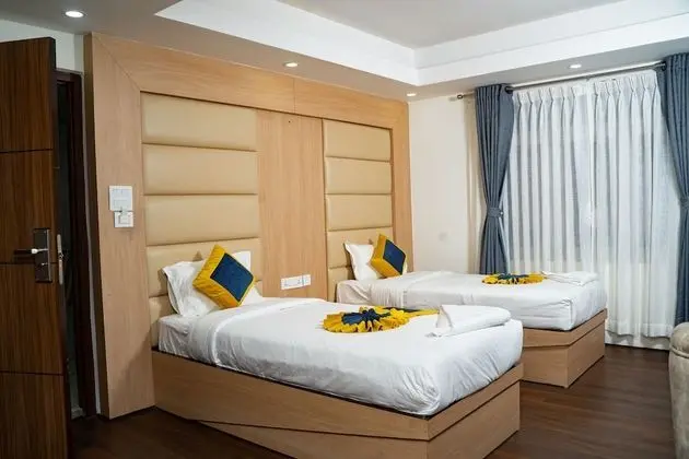 Deluxe Tek Büyük veya İki Ayrı Yataklı Oda