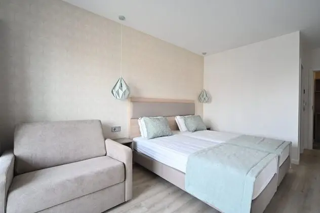 Tek Büyük veya İki Ayrı Yataklı Oda (Extra bed)