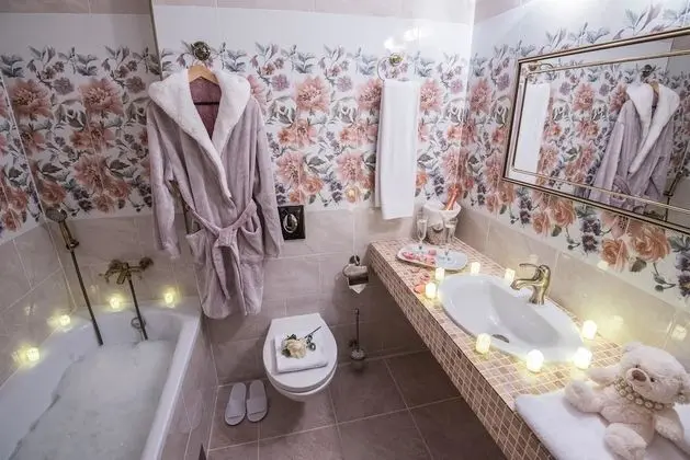 Deluxe Tek Büyük veya İki Ayrı Yataklı Oda