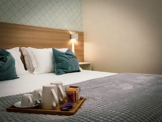 Deluxe Tek Büyük veya İki Ayrı Yataklı Oda