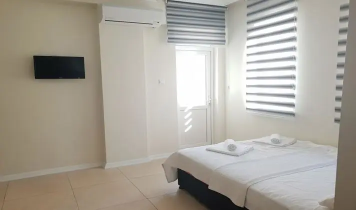 Üç Kişilik Oda