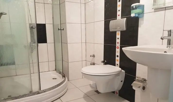 Üç Kişilik Oda