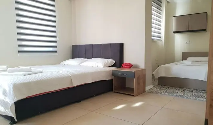 Üç Kişilik Oda