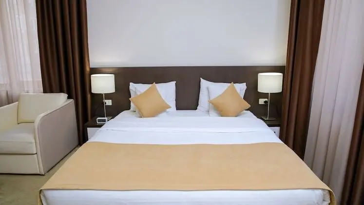 Deluxe Tek Büyük veya İki Ayrı Yataklı Oda