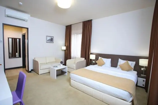 Deluxe Tek Büyük veya İki Ayrı Yataklı Oda