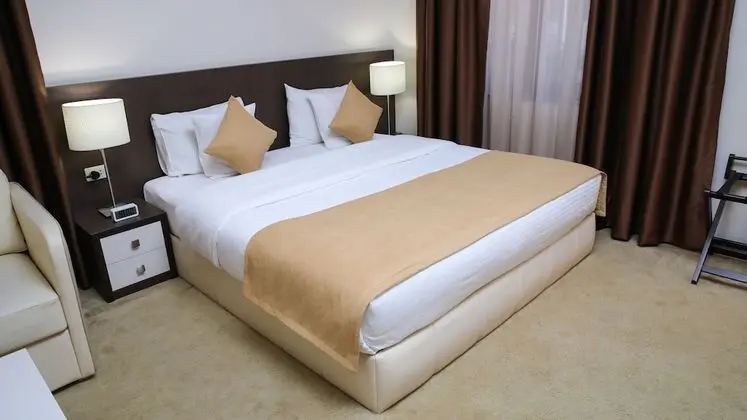 Deluxe Tek Büyük veya İki Ayrı Yataklı Oda