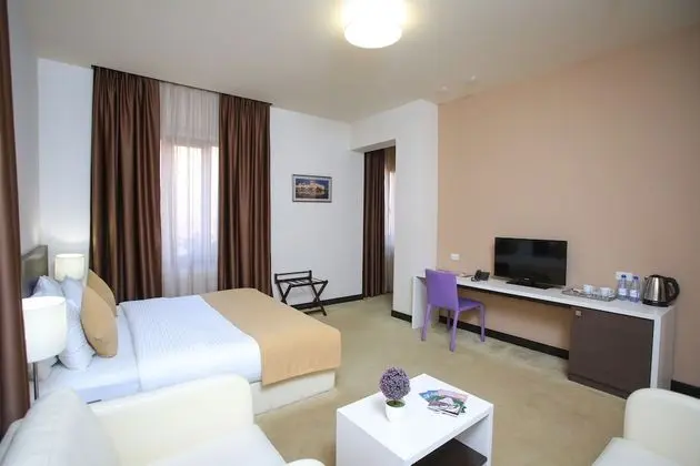 Deluxe Tek Büyük veya İki Ayrı Yataklı Oda