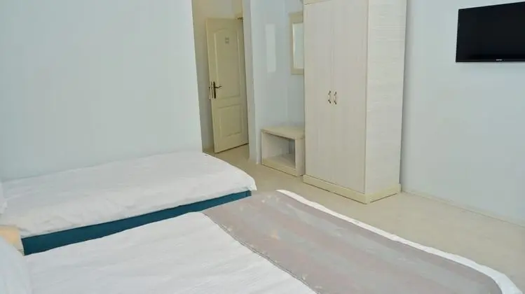 Üç Kişilik Oda