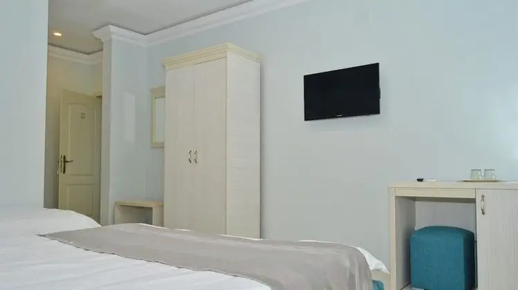 Üç Kişilik Oda