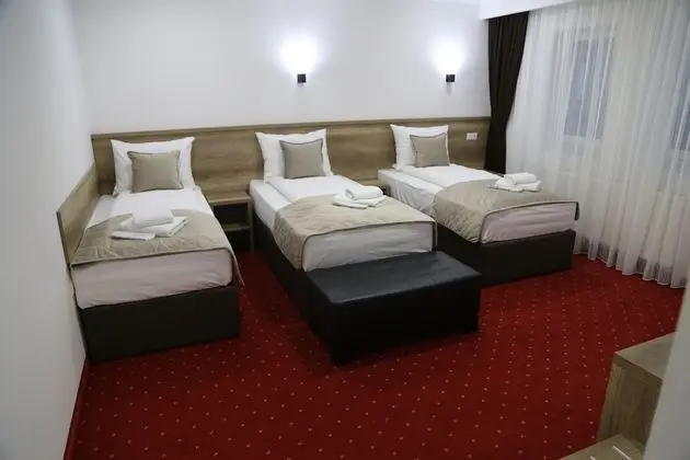 Deluxe Üç Kişilik Oda