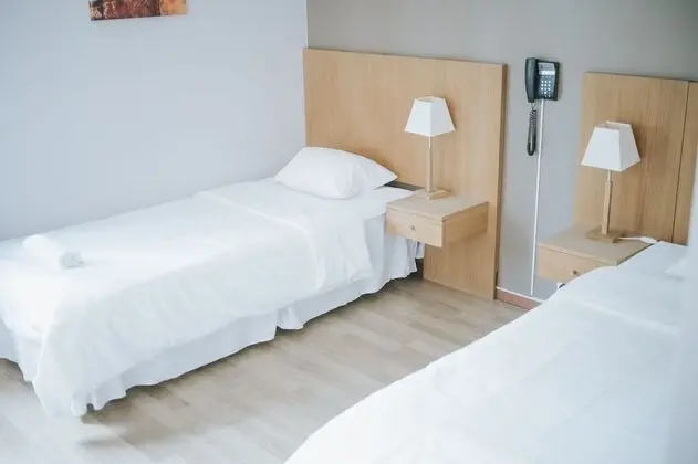 Basic Tek Büyük veya İki Ayrı Yataklı Oda