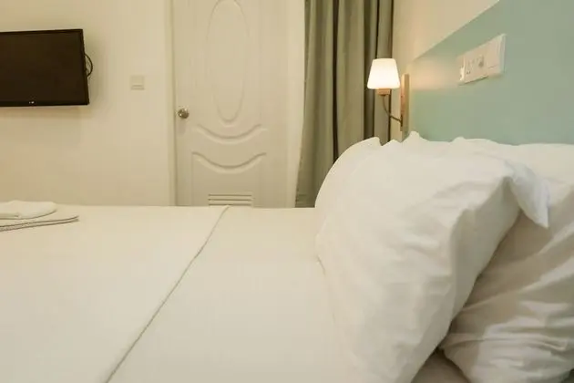 Deluxe Dört Kişilik Oda, Bahçe Manzaralı