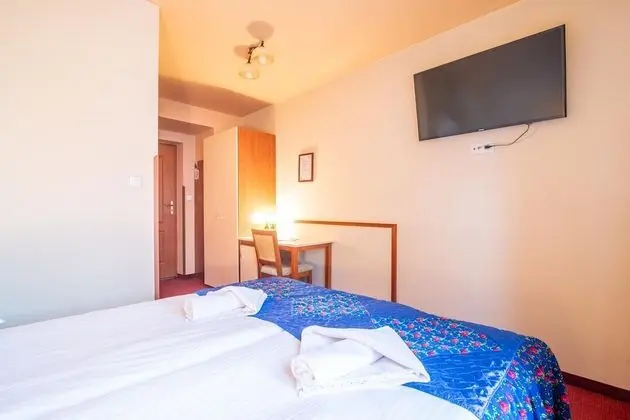 Basic Tek Büyük veya İki Ayrı Yataklı Oda