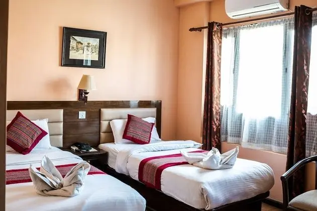 Deluxe Tek Büyük veya İki Ayrı Yataklı Oda