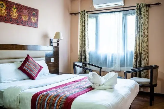 Deluxe Tek Büyük veya İki Ayrı Yataklı Oda