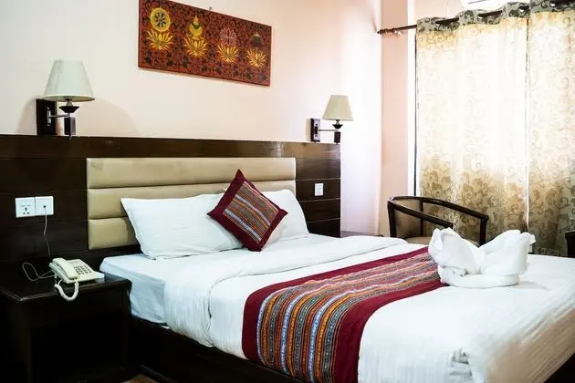 Deluxe Tek Büyük veya İki Ayrı Yataklı Oda