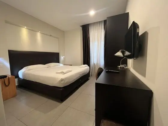 Basic Tek Büyük veya İki Ayrı Yataklı Oda