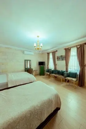 Standart Üç Kişilik Oda,Veranda Manzaralı