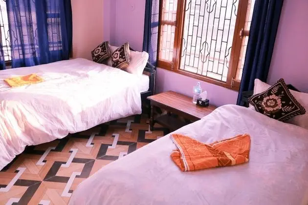 Deluxe Üç Kişilik Oda, Birden Çok Yatak, Sigara İçilmez, Bahçe Manzaralı