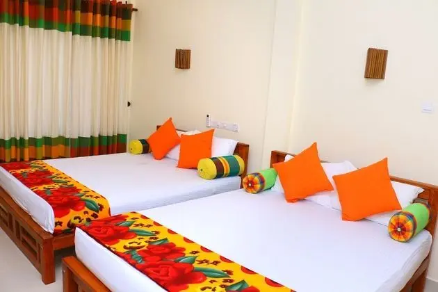 Deluxe Üç Kişilik Oda, Bahçe Manzaralı