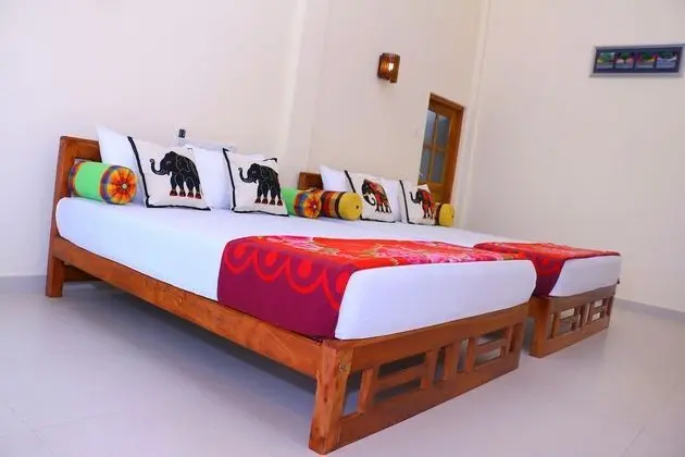 Deluxe Üç Kişilik Oda, Bahçe Manzaralı