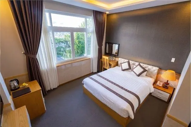 Deluxe Tek Büyük veya İki Ayrı Yataklı Oda