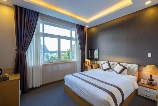 Deluxe Tek Büyük veya İki Ayrı Yataklı Oda