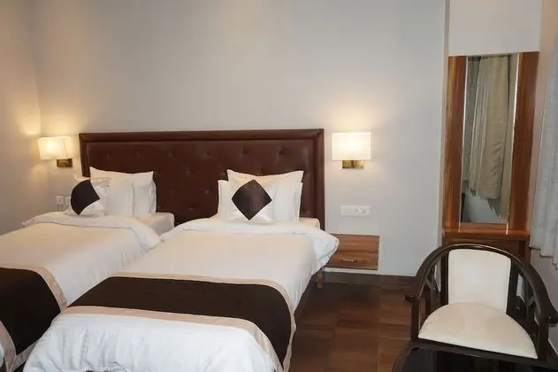 Deluxe Tek Büyük veya İki Ayrı Yataklı Oda