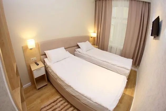 Economy Tek Büyük veya İki Ayrı Yataklı Oda