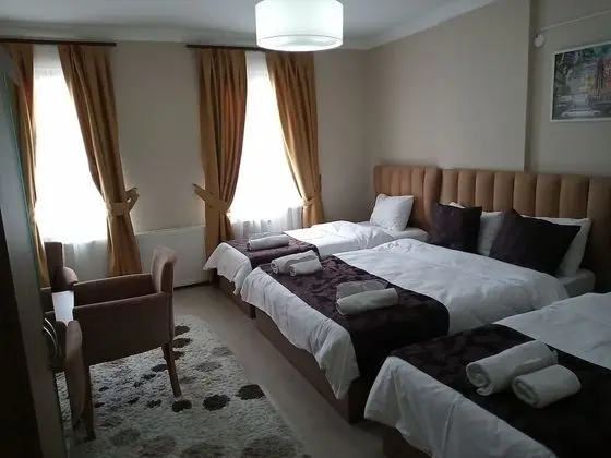 Üç Kişilik Oda