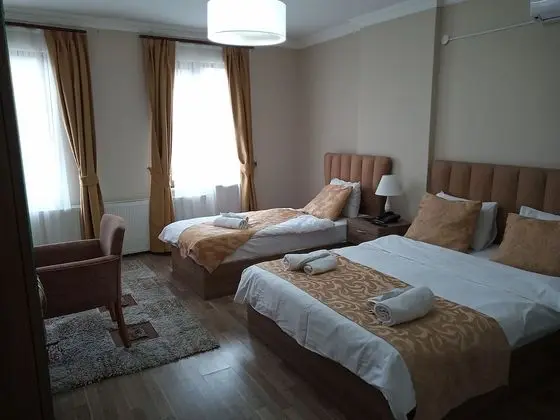Üç Kişilik Oda