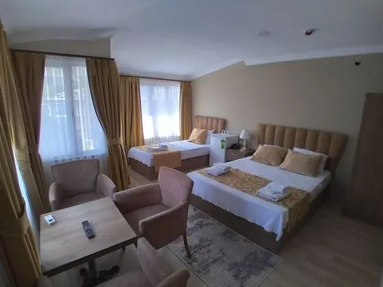 Üç Kişilik Oda
