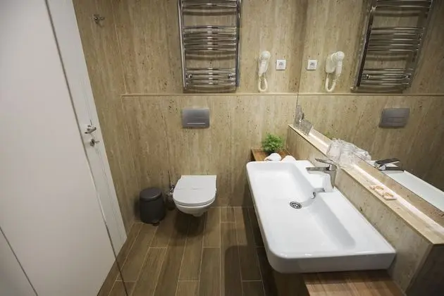 Deluxe Tek Büyük veya İki Ayrı Yataklı Oda