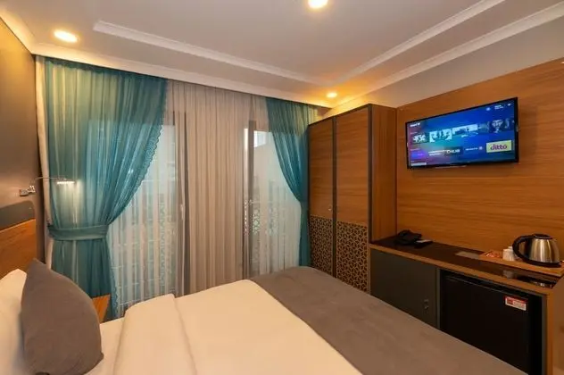 Deluxe Büyük Yataklı Tek Kişilik Oda