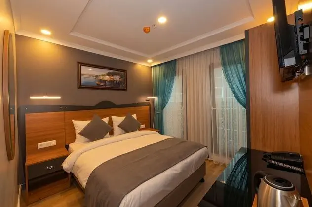 Deluxe Büyük Yataklı Tek Kişilik Oda