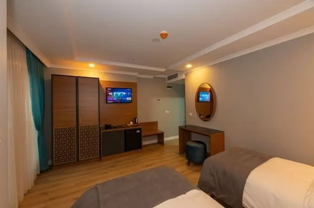 Deluxe Tek Büyük veya İki Ayrı Yataklı Oda