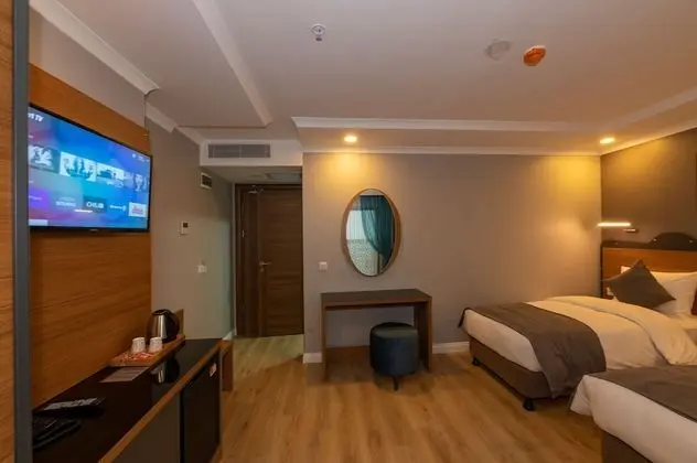 Deluxe Tek Büyük veya İki Ayrı Yataklı Oda