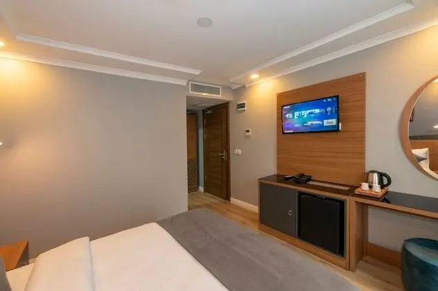 Deluxe Tek Büyük veya İki Ayrı Yataklı Oda