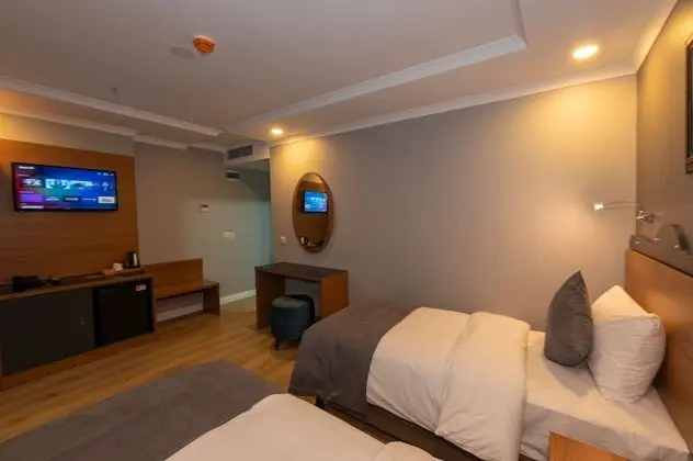 Deluxe Tek Büyük veya İki Ayrı Yataklı Oda