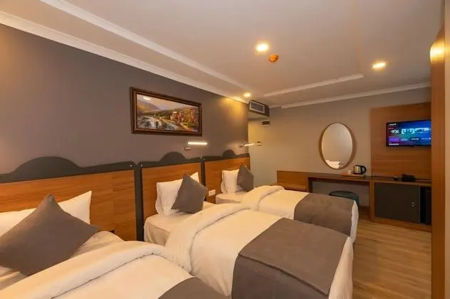 Deluxe Üç Kişilik Oda