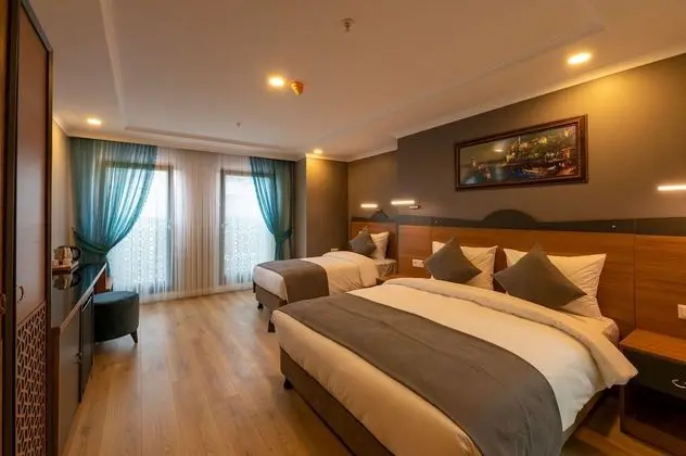 Deluxe Üç Kişilik Oda