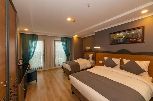 Deluxe Üç Kişilik Oda