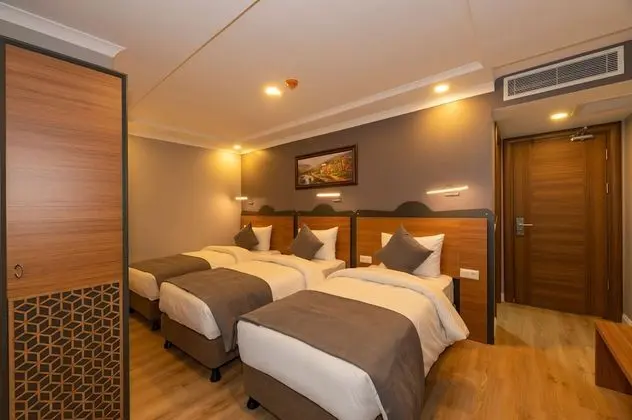 Deluxe Üç Kişilik Oda