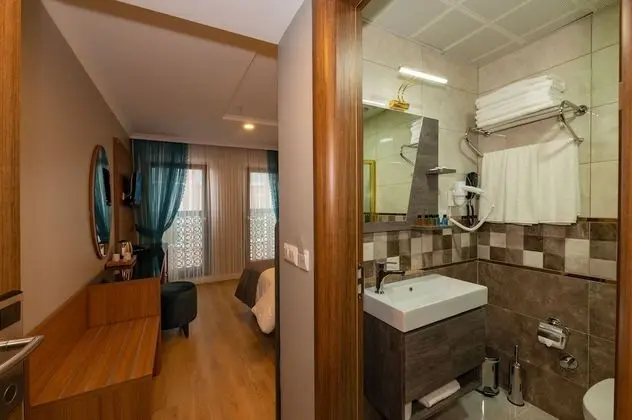 Deluxe Üç Kişilik Oda