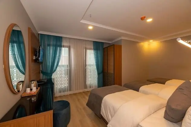 Deluxe Üç Kişilik Oda