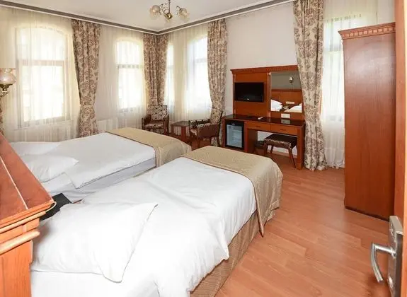 Deluxe Dört Kişilik Oda