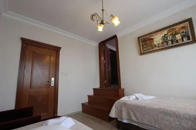 Deluxe Dört Kişilik Oda