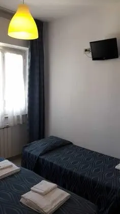 Üç Kişilik Oda